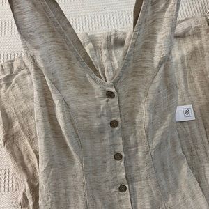 This is a “surf shack jumpsuit” from Rip Curl. This is a size small romper.